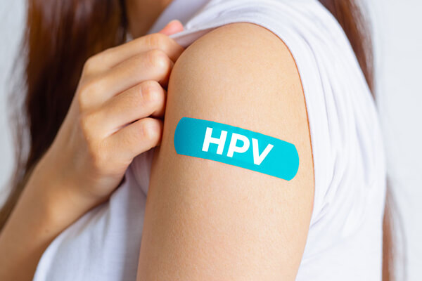 hpv vaccination provided at townsend pharmacy with bandage on upper arm