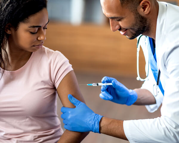 pharmacist giving hpv vaccine at townsend pharmacy